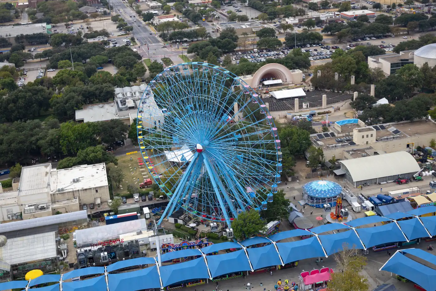 The Texas Star Ferris wheel and the fair midway at Fair Park, seen from above